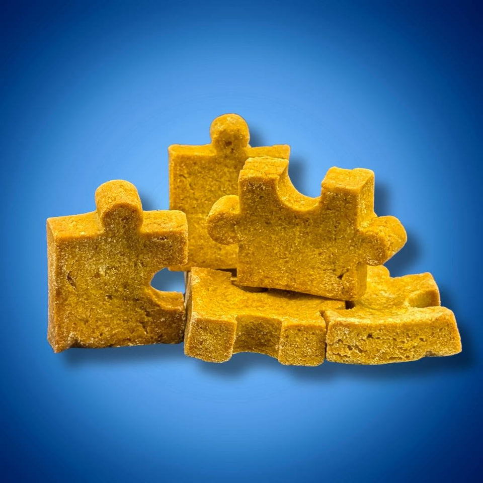 Supplied close-up photograph of the thick, golden puzzle-piece cookies.